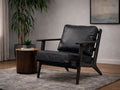 Designed with a sleek, contemporary silhouette, this accent lounge chair combines comfort with understated elegance.