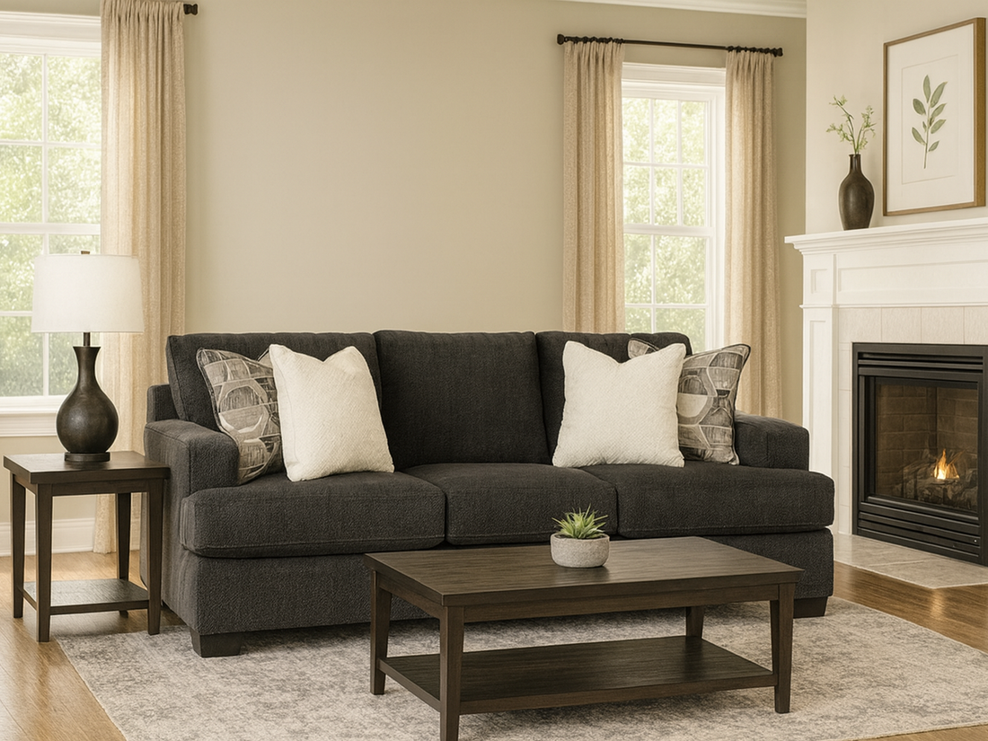 Living room with a gray Karinne sofa, coffee table, and fireplace.