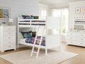 White bunk bed with ladder and colorful floral bedding in a bright kids' bedroom.