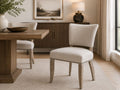 Luther Oyster Dining Chair in Calgary in a dining room setting. 