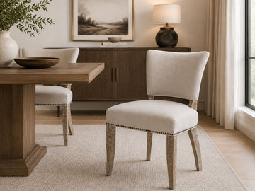 Luther Oyster Dining Chair in Calgary in a dining room setting. 