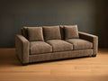 Memories Custom Sofa on a wooden floor with a dark wall background
