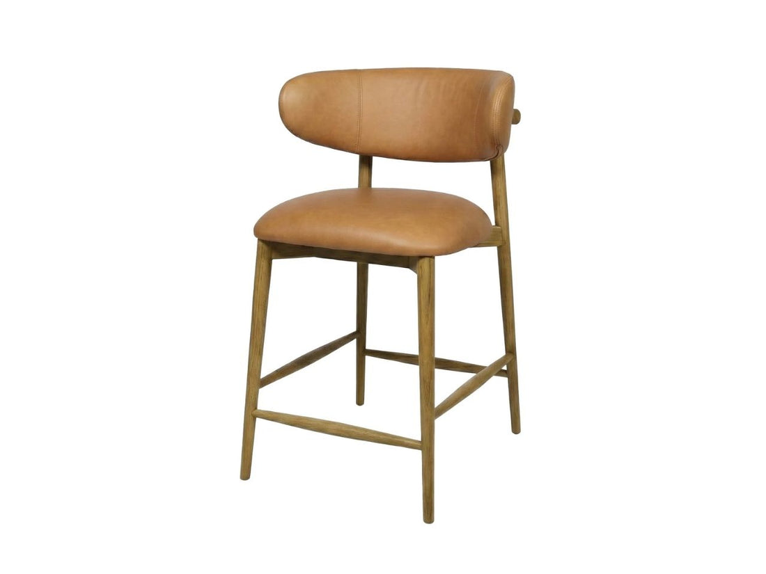 Tan leather counter stool with wood legs on a white background.