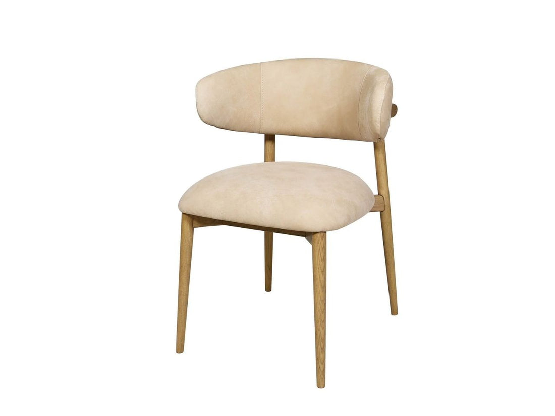 Beige upholstered dining chair with wood legs on a white background.