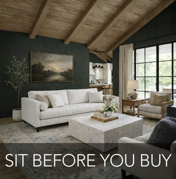 Modern living room with a gray sofa, coffee table, and decorative elements for Showhome furniture shop sofas in Calgary