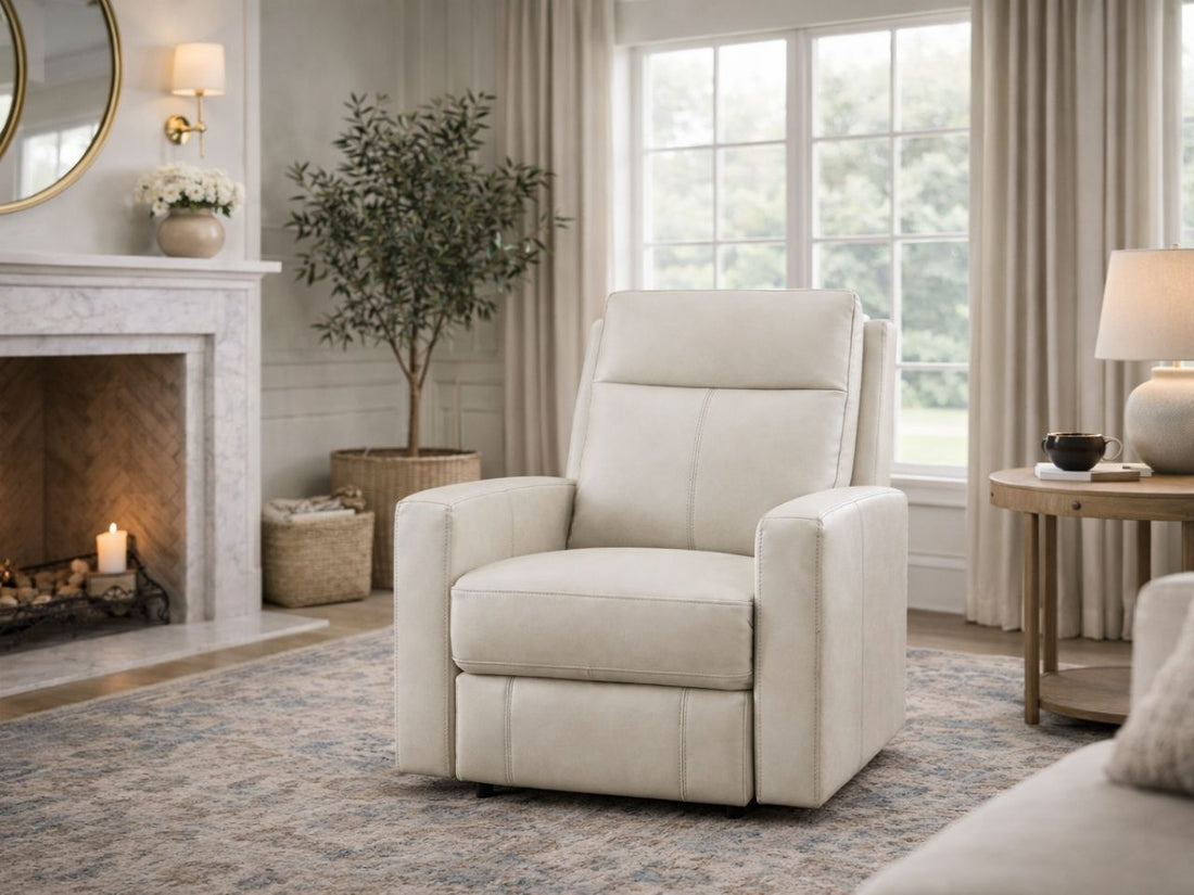 Brown reclining armchair upholstered in smooth leather or leather-look fabric, styled in a cozy living room with dark walls.