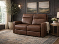 Warm brown reclining loveseat upholstered in genuine or faux leather, placed in a cozy, classic living room setting.