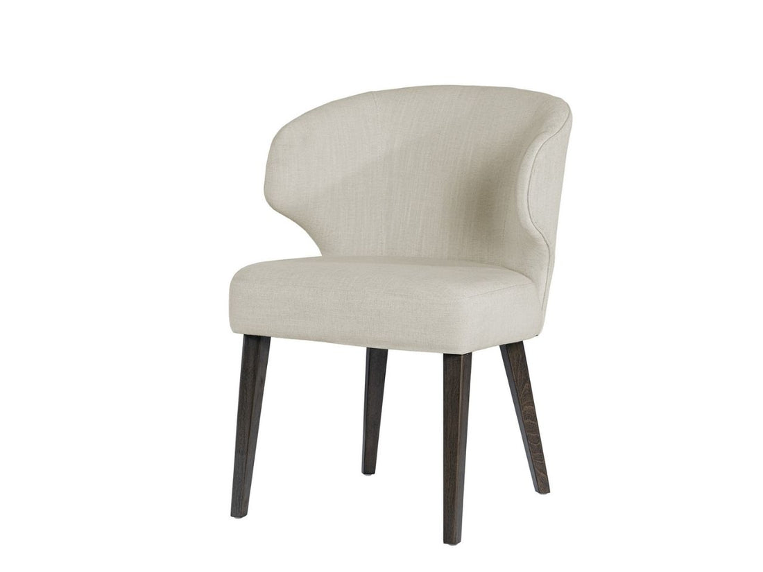 Niles Cream Fabric Wingback Dining Chair in Calgary with Dark Wood Legs in a white background
