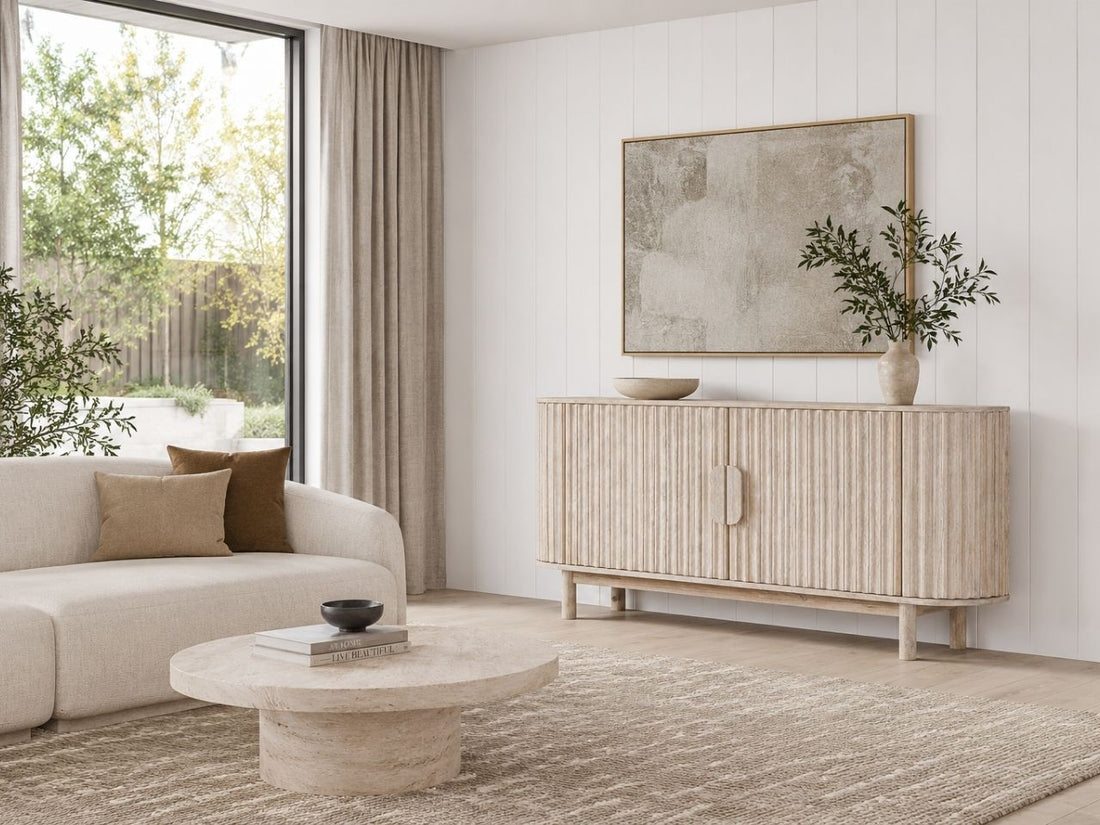 Elegant modern sideboard with a softly curved silhouette, fluted door fronts, and a light natural finish that creates a refined, organic aesthetic.