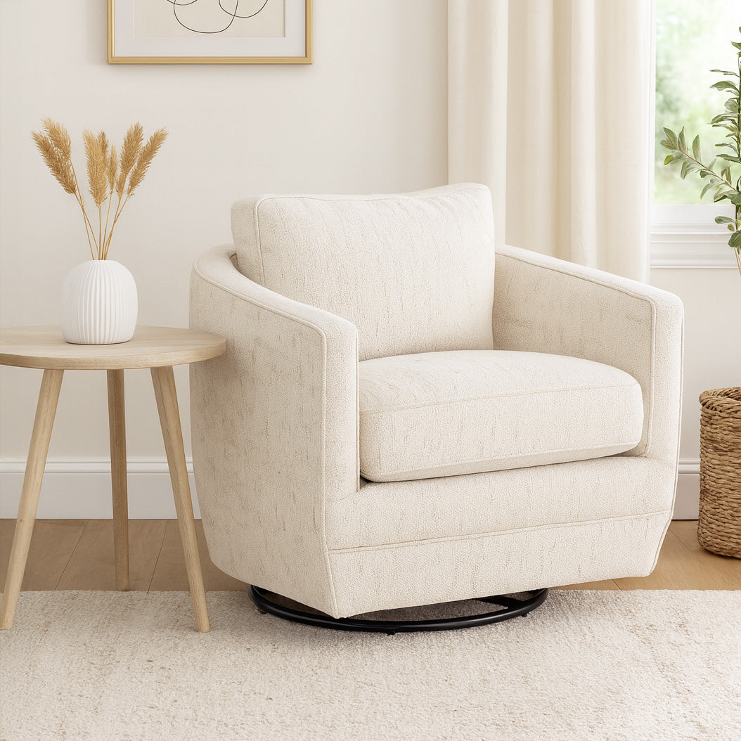 bright beige fabric swivel accent chair in a bright living room setting.