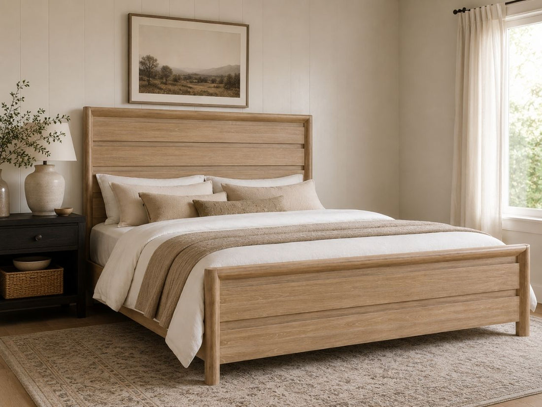 Light wood panel bed with a clean modern design in a warm, cozy bedroom.