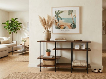 Dark wood console table with open shelves styled in a bright modern hallway.