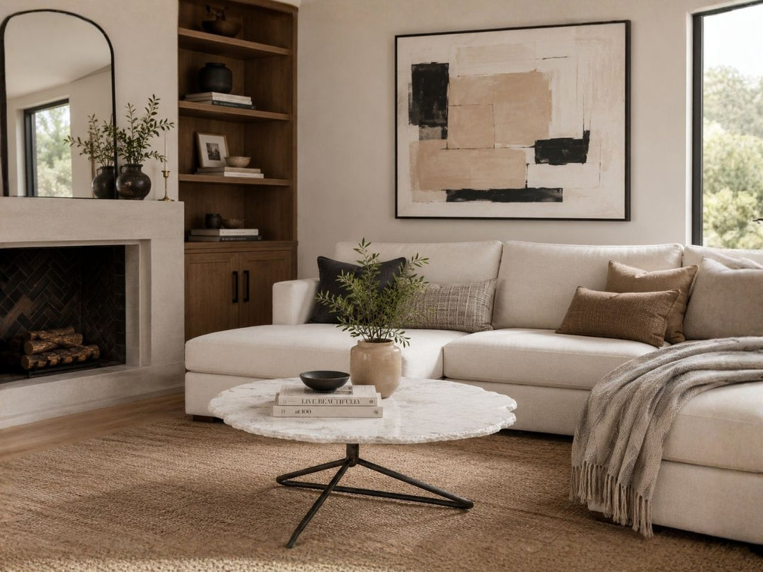 Round marble coffee table in a modern living room.