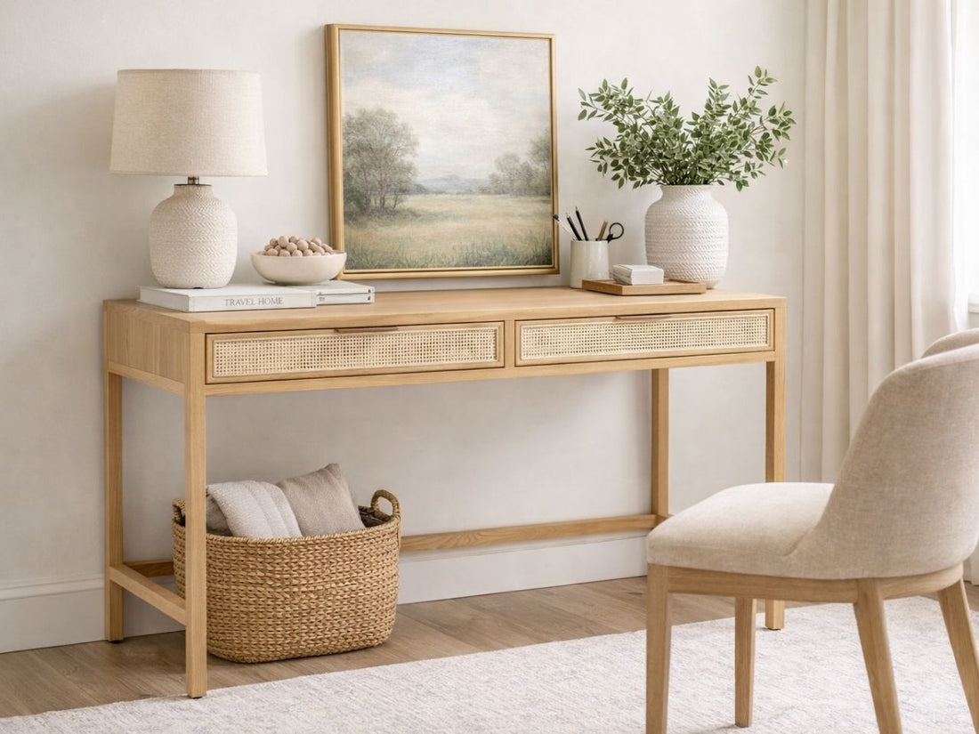This writing desk features a clean, Scandinavian-inspired design crafted from light-toned wood with a natural finish.