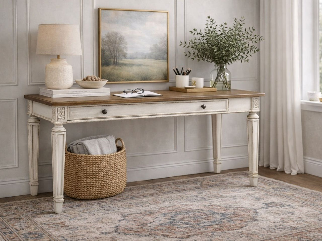 writing desk features a two-tone traditional design, combining a smooth, medium-brown wooden tabletop with a distressed antique white base.