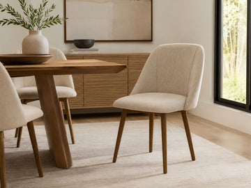 Ronald Cream Dining Chair in a dining room setting. 