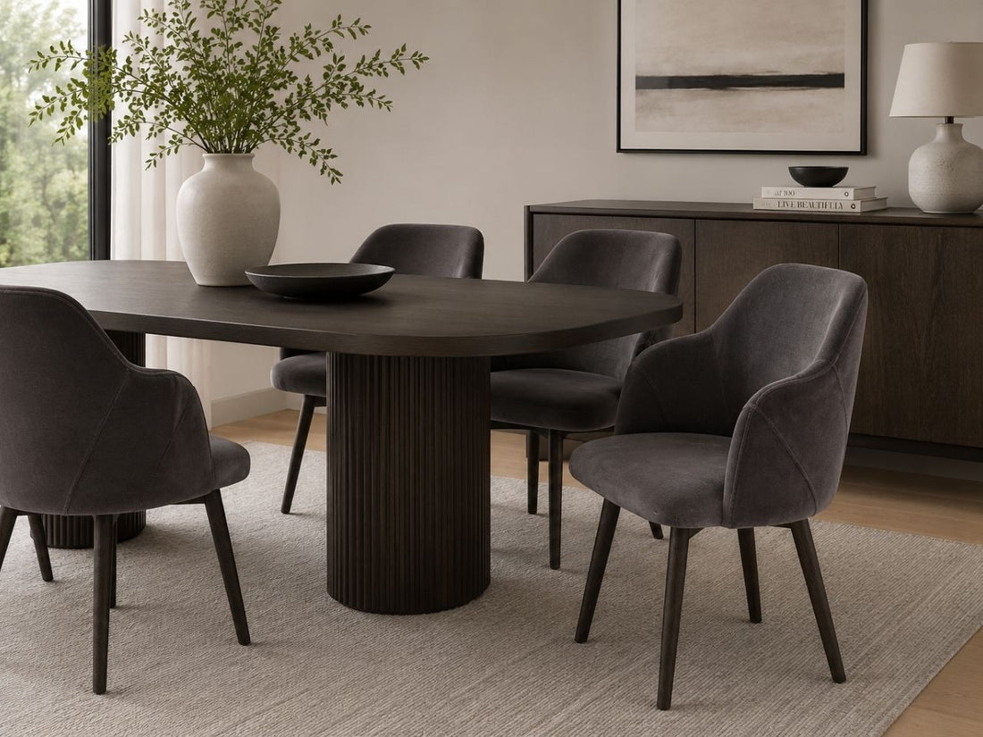 Ronald Grey Dining Arm Chair in a dining room setting. 