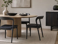 Rotondo Black Metal Dining Chair in a dining room setting. 