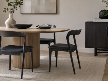 Rotondo Black Metal Dining Chair in a dining room setting. 