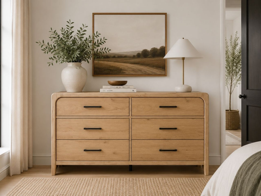 Light wood double dresser with modern curves and spacious storage drawers.