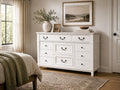 White farmhouse dresser with nine drawers, black hardware, and classic framed detailing.