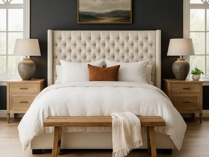 Neatly made Panama bed in Calgary with white bedding and a wooden bench in a bedroom setting.