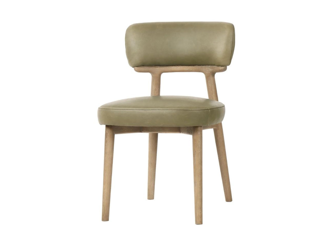 Sage green leather dining chair with wood legs on a white background.