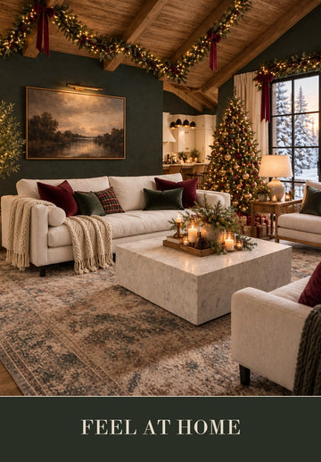 Modern living room with a gray sofa, coffee table, and decorative elements for Showhome furniture shop sofas in Calgary
