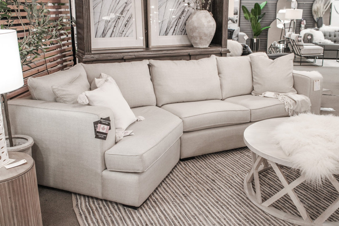 Gray fabric sectional in a bright modern living room.