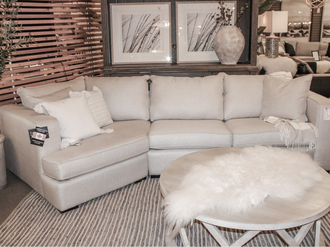 Gray fabric sectional in a bright modern living room.